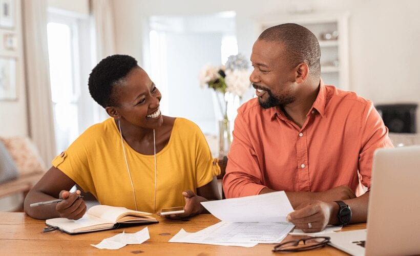 african american couple going over utilities liheap eligibility