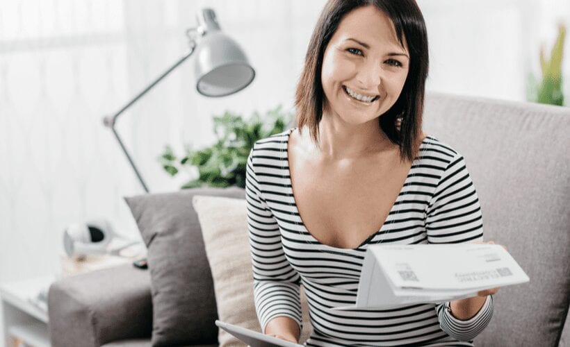 woman with utility bill liheap requirements