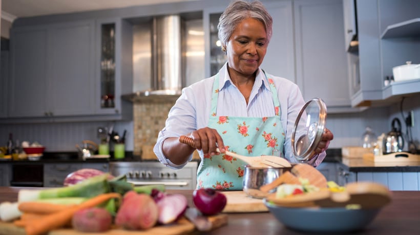 senior woman cooking snap eligibility