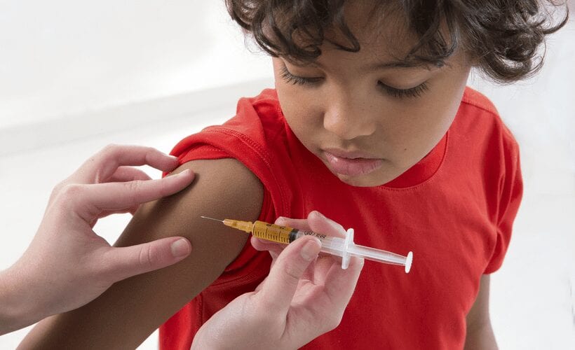 child getting vaccine