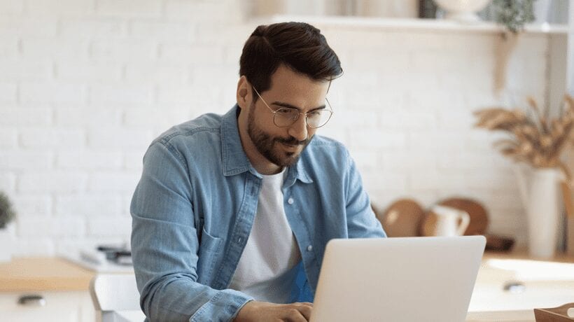 man computer working study