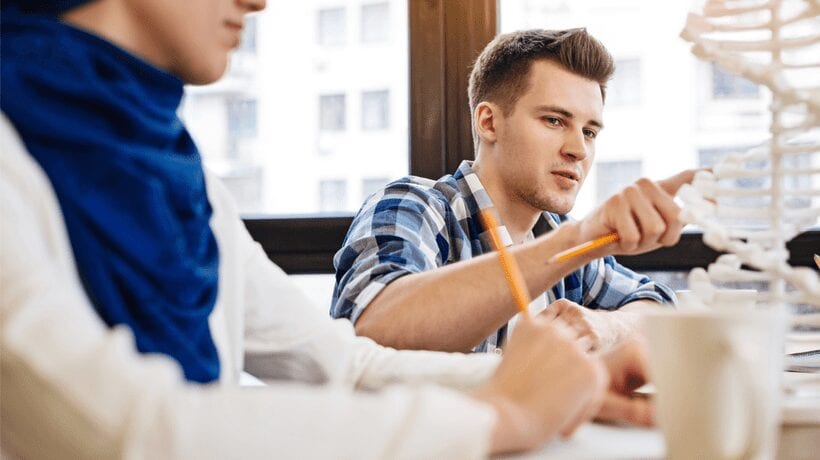 man studying dna using gi bill benefits