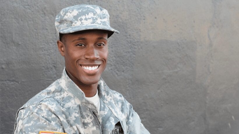 servicemember smiling gi bill benefits