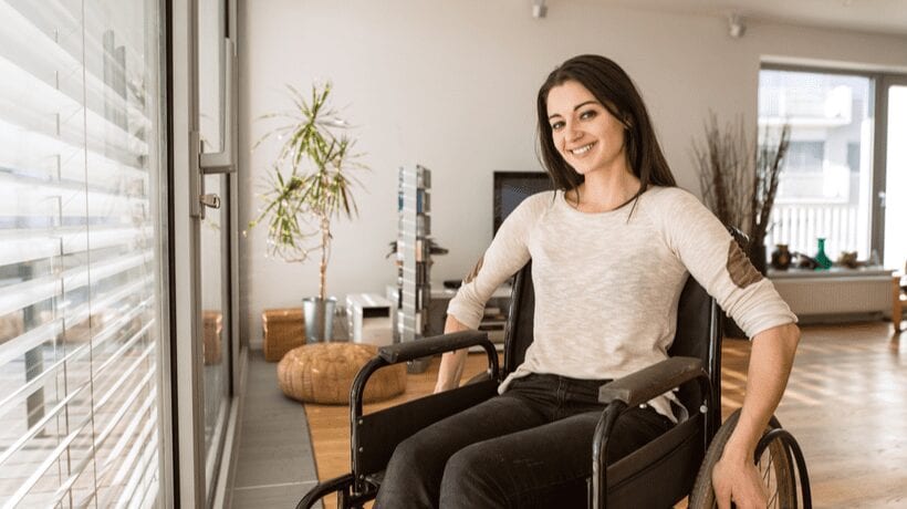 disabled woman at home Disability Housing Grants