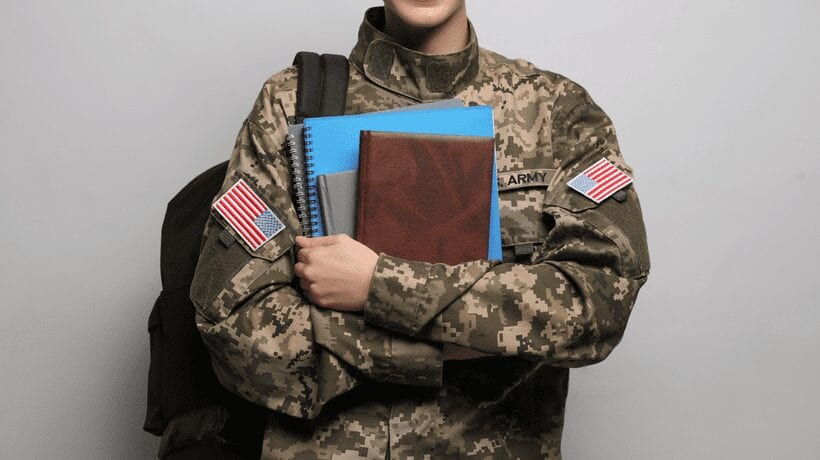 military man with books montgomery gi bill
