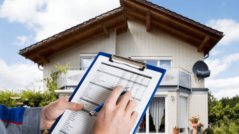 man inspecting house form VA Appraisal Requirements